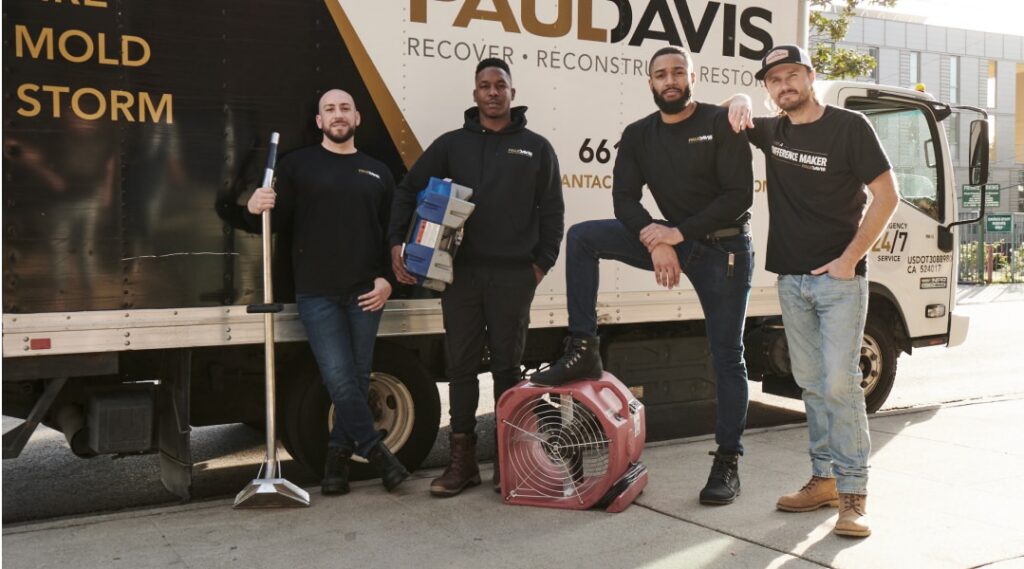 Paul Davis Restoration team with equipment and service truck ready for water, fire, mold, and storm damage restoration in Greater Portland ME.